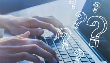 Photo of hands typing on a laptop with question marks over it. This illustrates the article Deception Detection: 3 Questions to Ask
