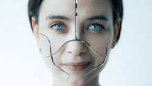How Close Are We to Transhumanism? photo of a female face marked to appear robotic or not quite human