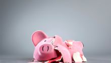 Photo of a broken piggy bank to illustrate the article, Should We Worry About Growing World Debt?